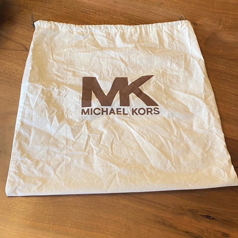 Michael Kors East West Ring Bag in a metallic, distressed leather